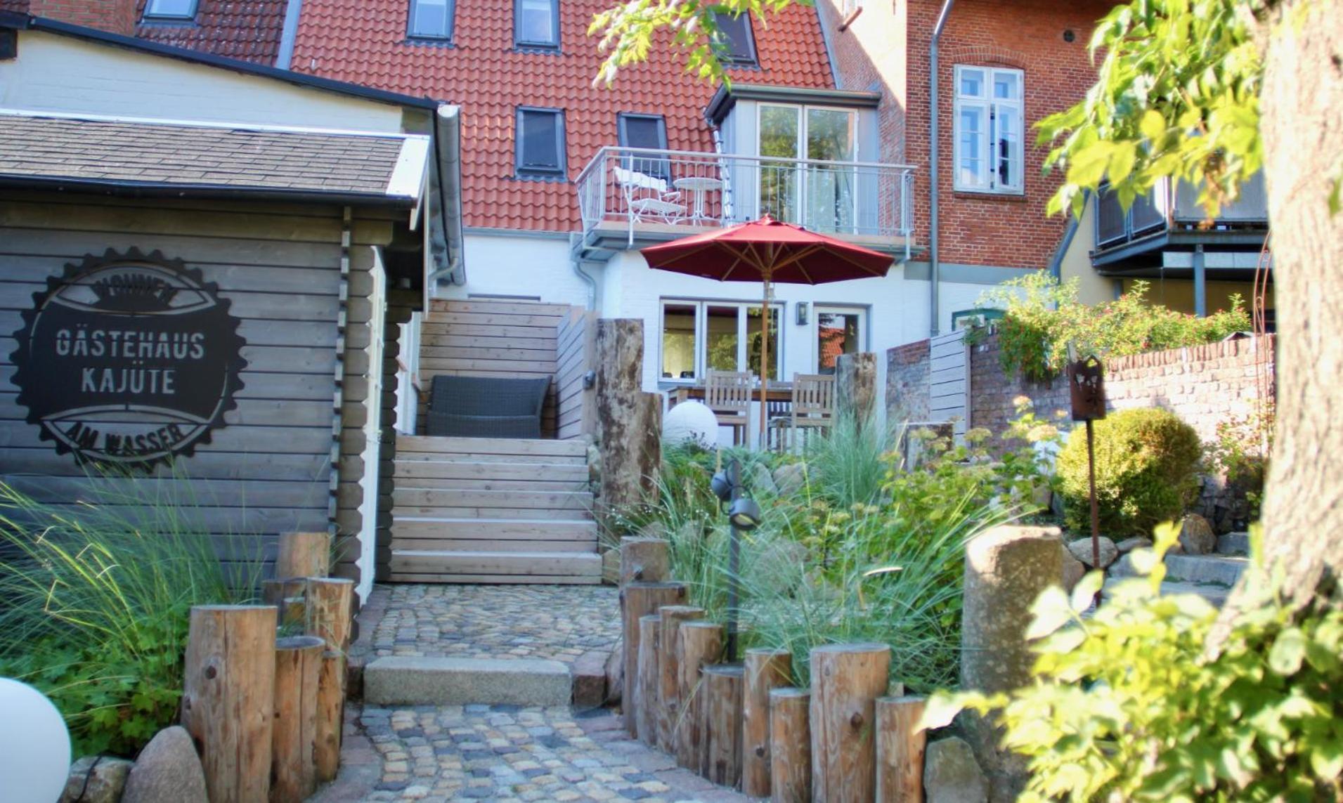 Gaestehaus Kajuete Direkt Am Wasser Friedrichstadt Esterno foto